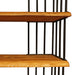 Close-up of the upper shelves of the Fargo Metal Wood Bookcase, displaying decorative items.