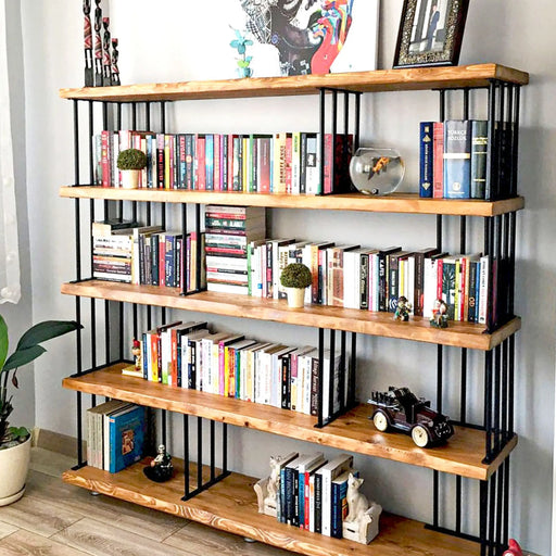 Close-up of the sturdy, solid wood shelves of the Fargo bookcase with a natural wood grain finish.