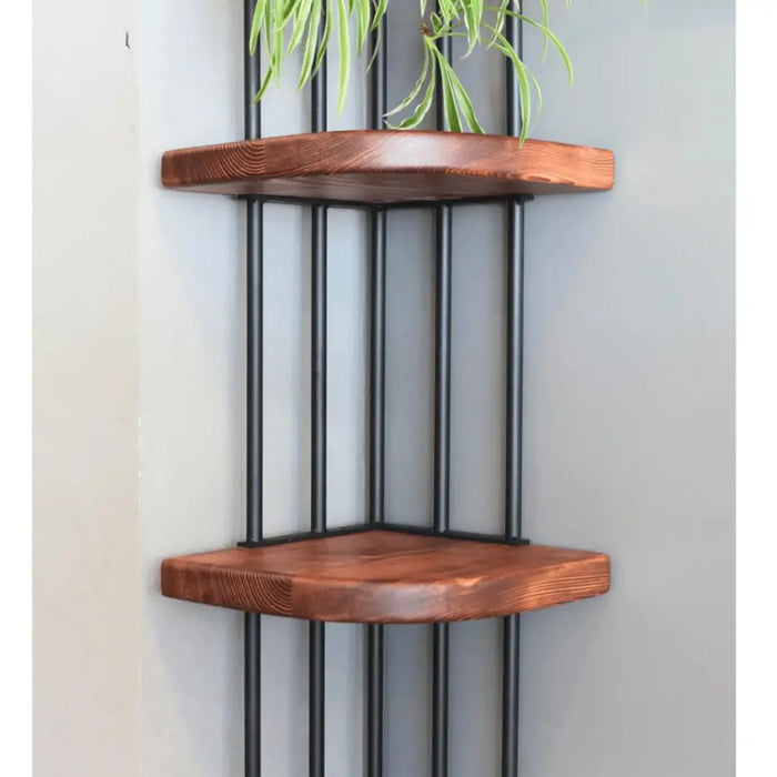 Close-up of the Fargo corner bookcase showing its solid pine wood shelves and sturdy metal frame.