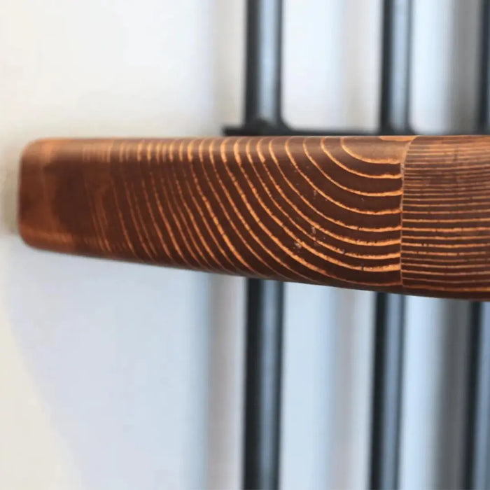 Side view of the Fargo corner bookcase demonstrating its compact design for corner placement.