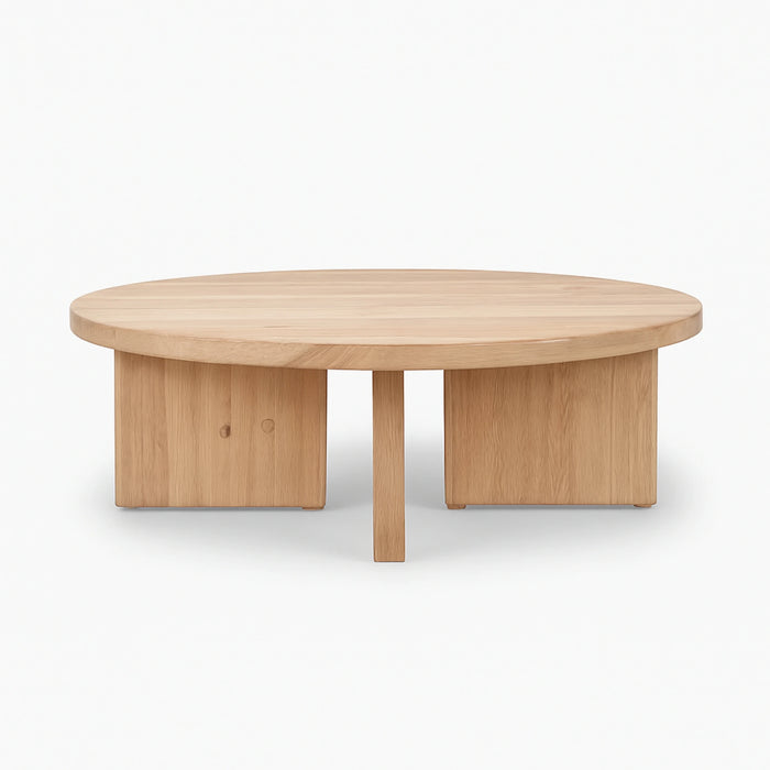 Handcrafted modern round coffee table with natural finish