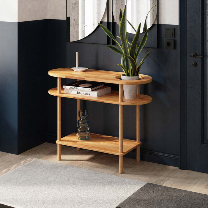 Side view of the modern entryway table in a hallway, highlighting the narrow, space-saving design and elegant beech wood finish.