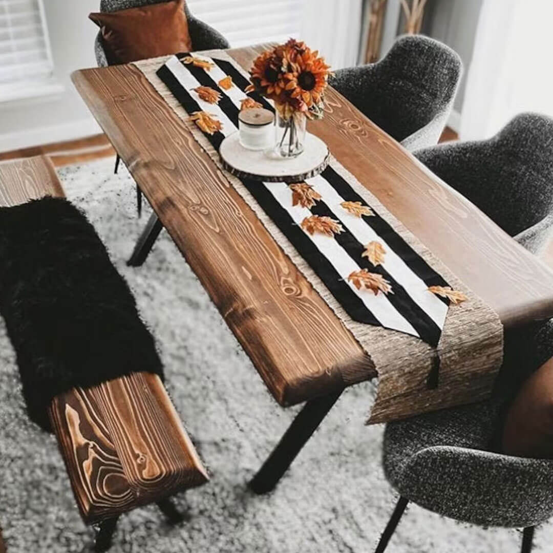 Elegant rustic dining table made from solid pine wood, showcasing natural wood grain and custom finishes.