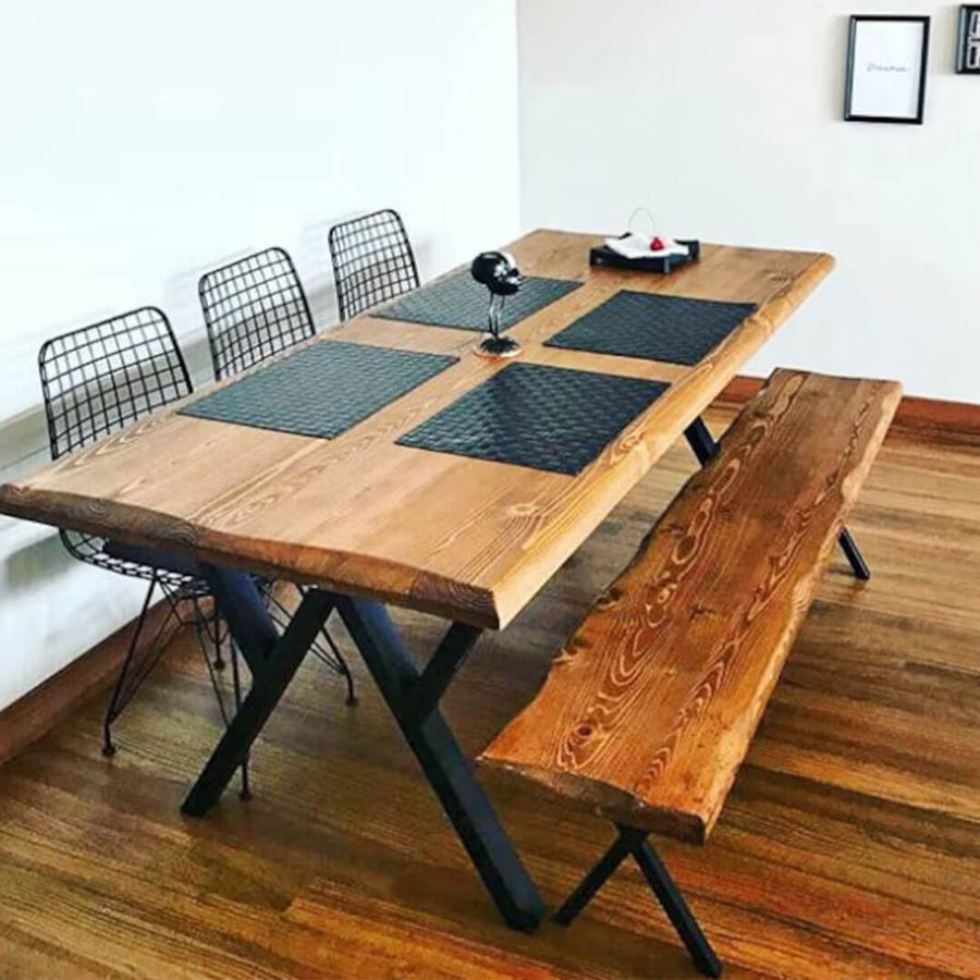 Beautiful rustic dining table crafted from solid pine wood, showcasing its natural grain and unique craftsmanship