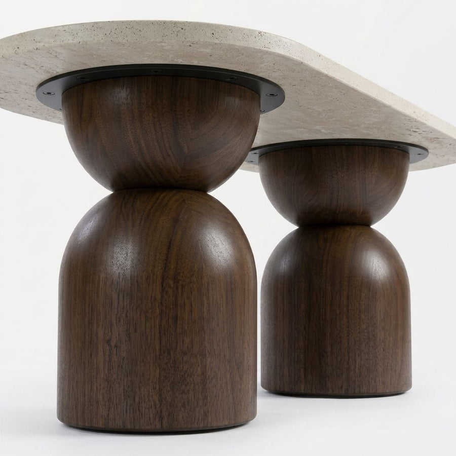 Low-Angle Close-Up of Sculptural Walnut Wooden Base and Metal Connection on Koffel Oval Travertine Coffee Table - Organic Modern Design by Tomruque