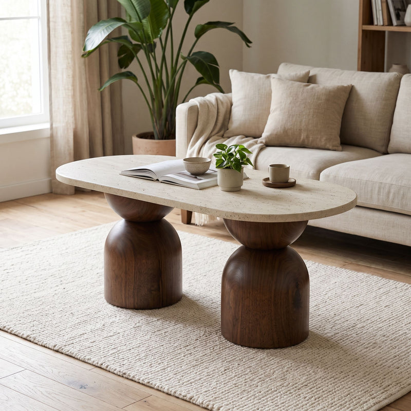 Koffel Oval Travertine Coffee Table with Walnut Wood Base - Sculptural Organic Modern Design Styled in a Cozy Living Room by Tomruque