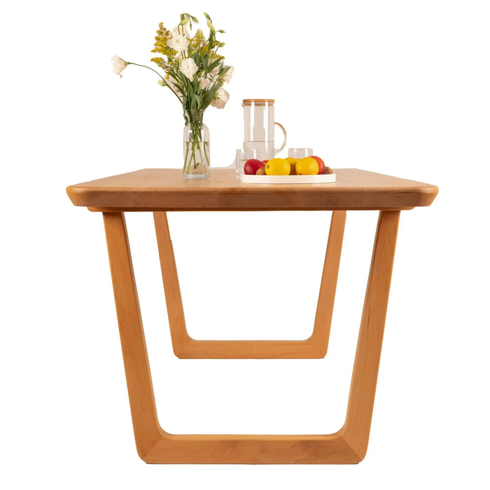 The dining table as part of a family gathering, highlighting its functionality and timeless design.
