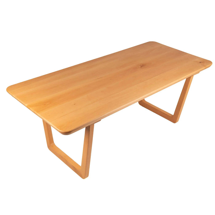 Side angle of the dining table, emphasizing the clean, minimalist lines and sturdy leg structure.