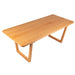 Side angle of the dining table, emphasizing the clean, minimalist lines and sturdy leg structure.