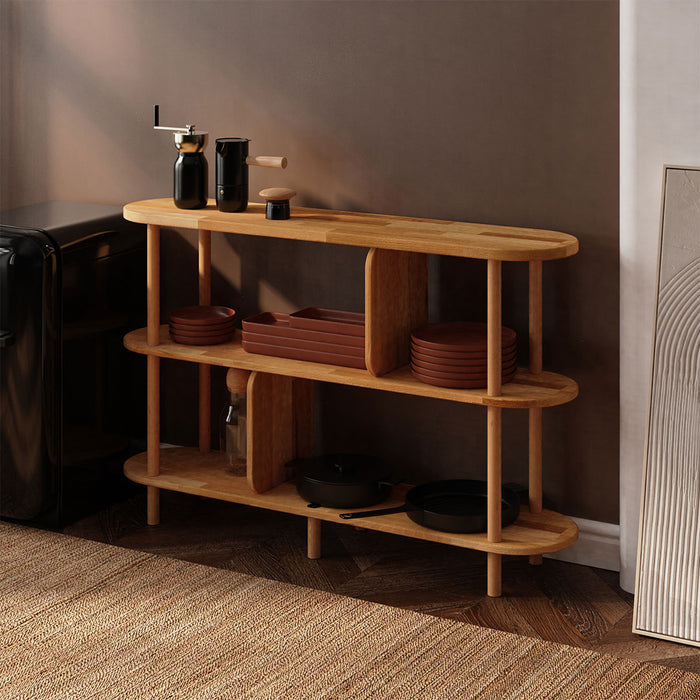 Malibu Low Bookcase styled with books and decor to illustrate its storage potential.