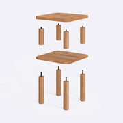 The Manhattan Beech Wood Small End Table placed beside a sofa, demonstrating its functional design