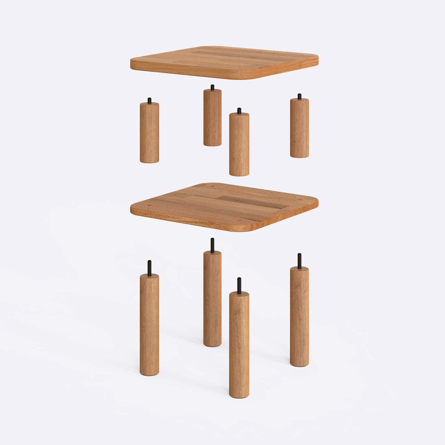 The Manhattan Beech Wood Small End Table placed beside a sofa, demonstrating its functional design