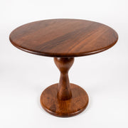 Mason Solid Walnut Round Pedestal Dining Table | Sculptural Base
 with a rich dark brown wood grain finish, photographed on a clean white background.