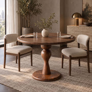 Mason Solid Walnut Round Pedestal Dining Table | Sculptural Base photo in a dining room with two chairs