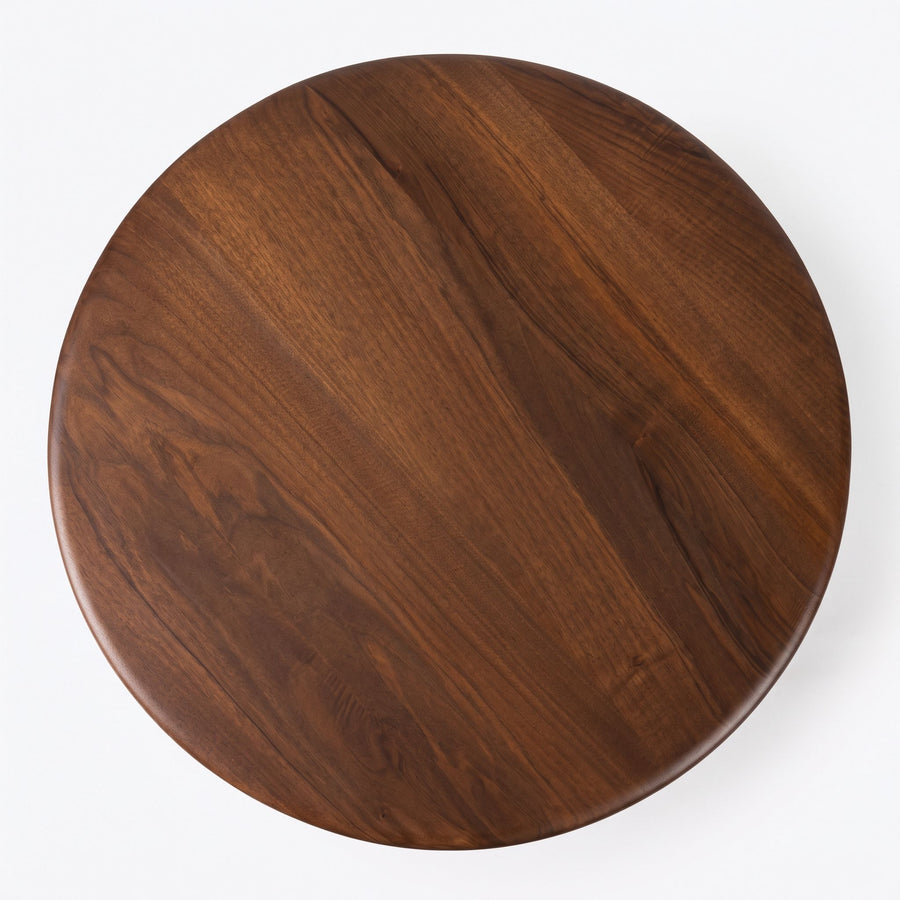 Mason Solid Walnut Round Pedestal Dining Table | Sculptural Base
 with a rich dark brown wood grain finish, photographed from directly above on a clean white background.