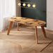 Corner view of the Monroe oval dining table in a bright, airy room, complementing modern décor.