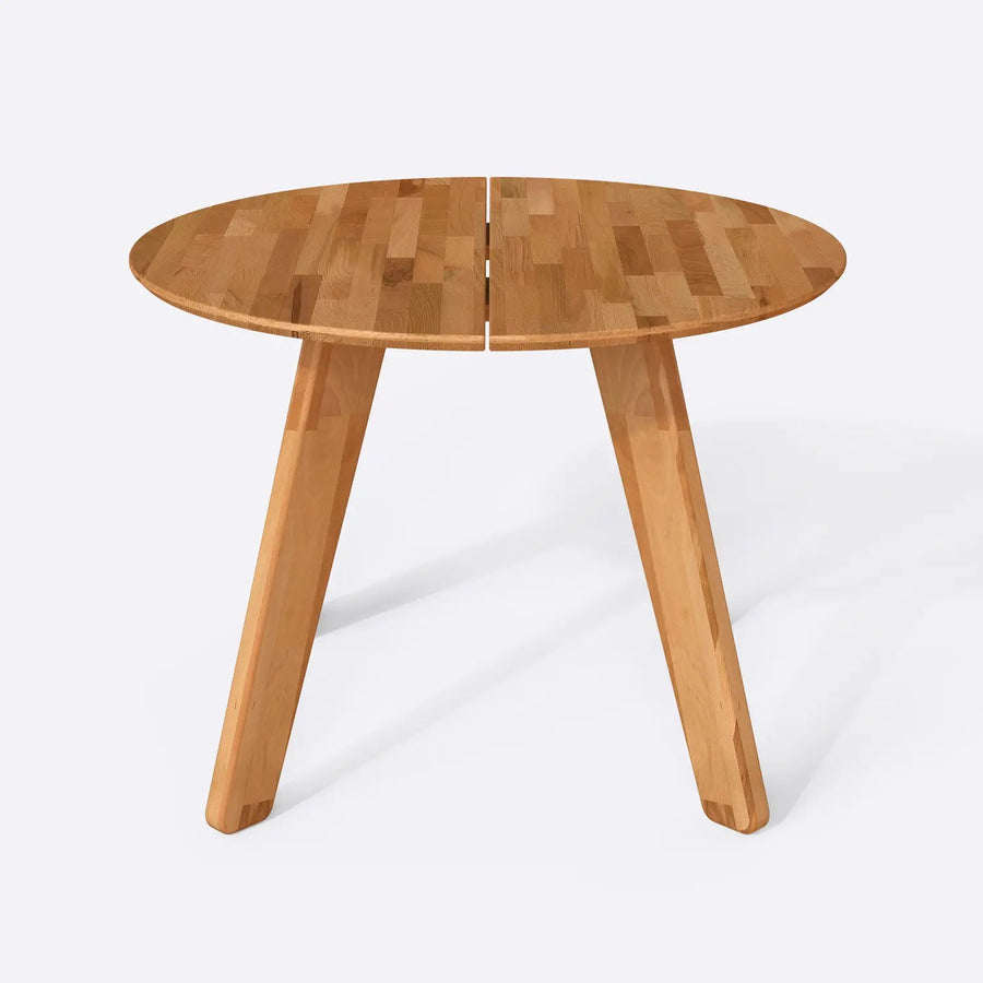 Close-up of the table's solid wood grain, highlighting the natural texture and craftsmanship.