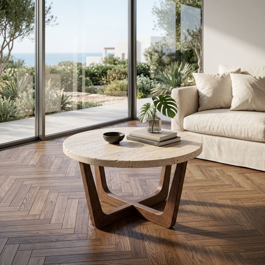 Muse Round Travertine Coffee Table with Walnut Wood Base - Mid-Century Modern Cross Base Design Styled in a Coastal Living Room by Tomruque