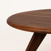 a close-up to the table top and the walnut's natural grains