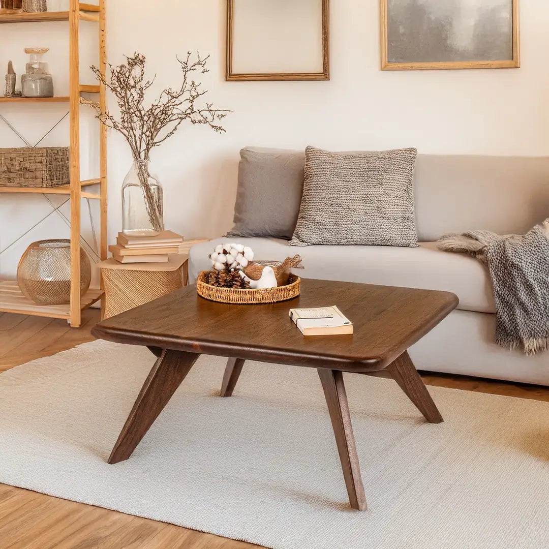 Sidney Round Coffee Table made from solid walnut wood, featuring a sleek mid-century modern design. Perfect for adding elegance to any living space, ideal for those seeking solid wood coffee tables.