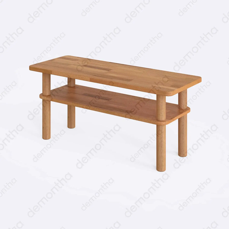 Porto modern wood coffee table styled with a decorative vase and books on top.