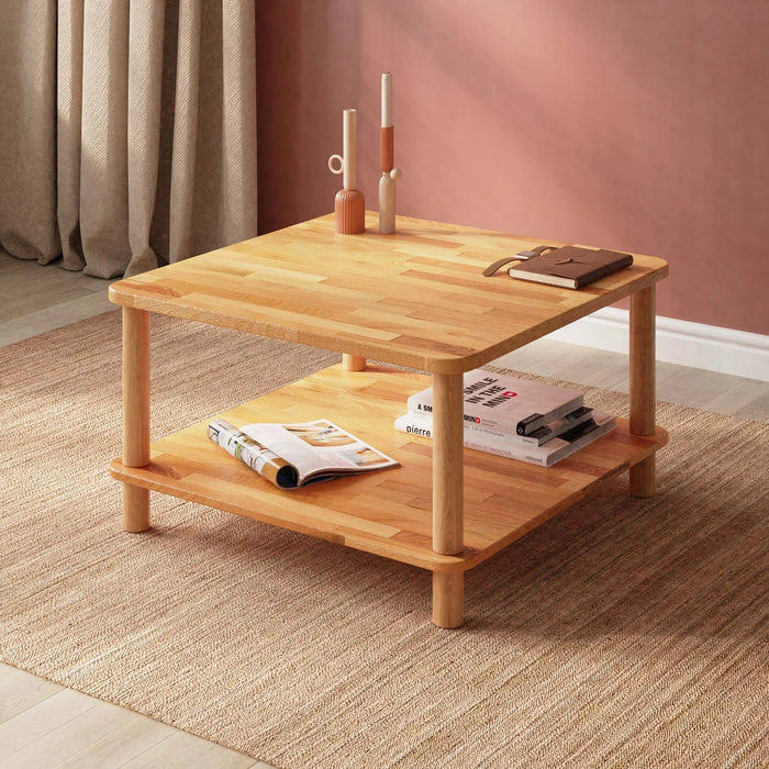 Solid wood coffee table with a storage shelf large size from a diagonal angle in a light colored hall setting.