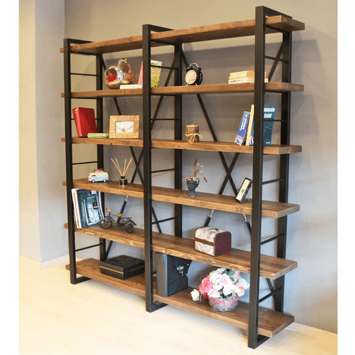 Close-up of the Renton Industrial Bookcase's sturdy metal frame and natural wood shelves, highlighting its industrial design.