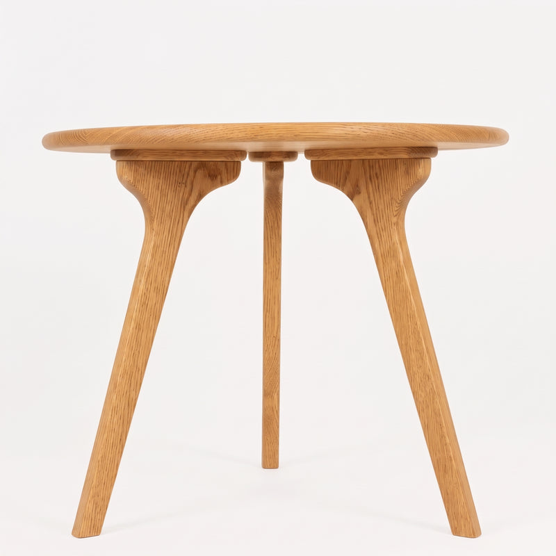 Sidney Circular Dining Table Solid Oak Wood – Mid-Century Modern Design with a round top and three tapered legs, shown against a plain white background.