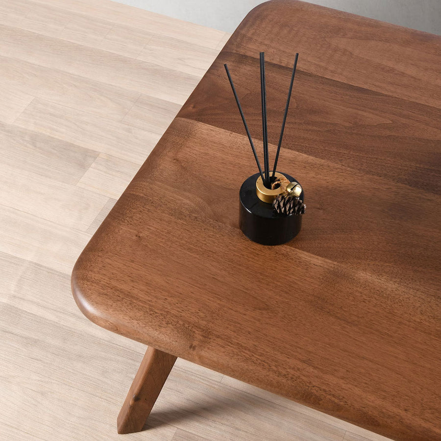 Sidney Rectangular Cocktail Table made of solid walnut wood, featuring a mid-century modern design with clean lines and a rich wood finish upper view with zoomed in lense