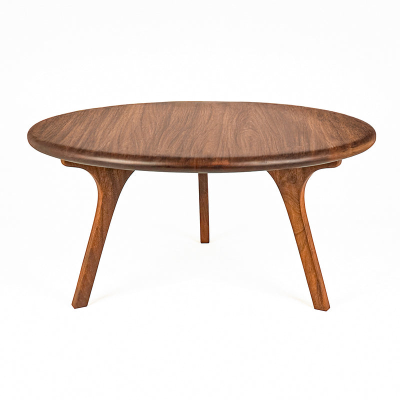 Sidney Round Coffee Table - Solid Walnut Wood - Mid Century Modern Design with a rich brown wood grain finish and curved splayed legs, shown on a solid white background.