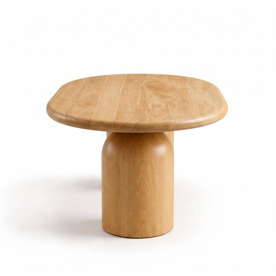 Side view of Solen Oval Coffee Table – Beech Wood Modern Sculptural Design showcasing its thick cylindrical pedestal leg and rounded edge.
