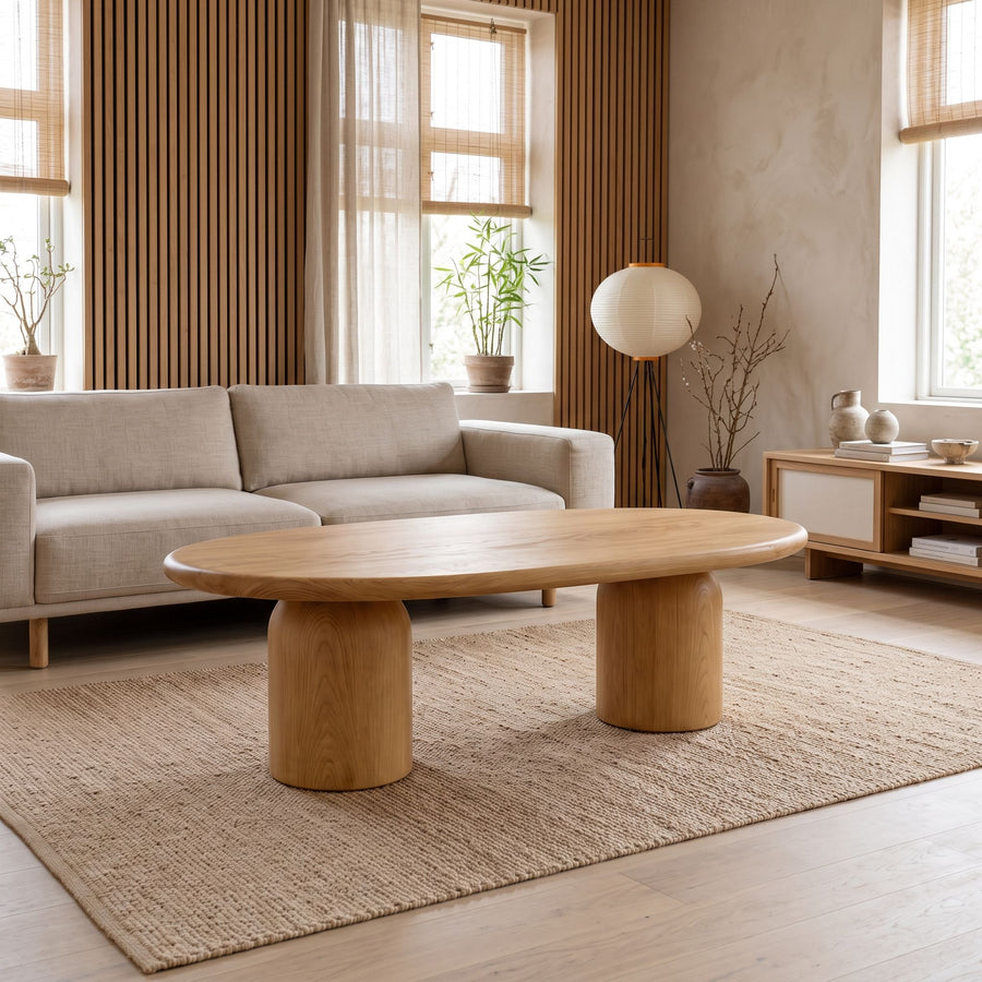 The Solen Oval Coffee Table – Beech Wood Modern Sculptural Design in a natural finish styled in a minimalist Japandi living room.