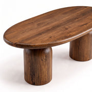 High-angle close-up view of the Solen Oval Solid Wood Coffee Table – Oak & Walnut Sculptural Double Pedestal Design in a rich walnut finish.