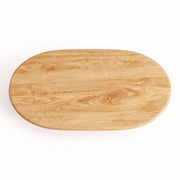 Top-down overhead view of the Solen Oval Solid Wood Coffee Table – Oak & Walnut Sculptural Double Pedestal Design showcasing its natural wood grain pattern.