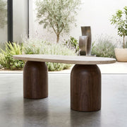 Solen Oval Travertine Coffee Table with Walnut Wood Base - Sculptural Organic Modern Design Styled in a Modern Patio Living Space by Tomruque