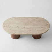 High Angle Studio View of Solen Oval Travertine Coffee Table with Walnut Wood Base - Sculptural Organic Modern Design by Tomruque