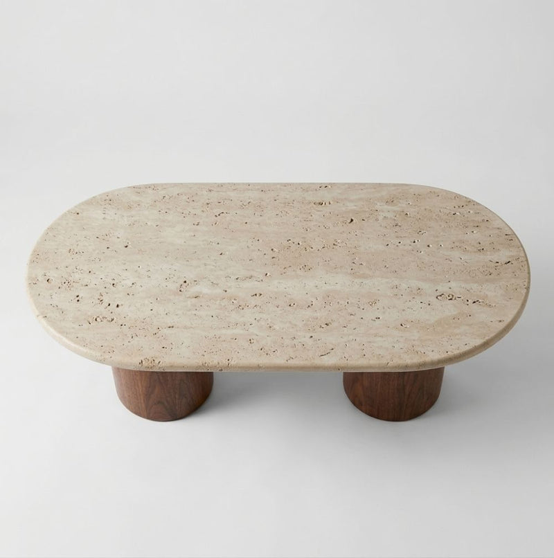 High Angle Studio View of Solen Oval Travertine Coffee Table with Walnut Wood Base - Sculptural Organic Modern Design by Tomruque