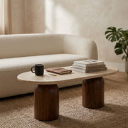 Solen Oval Travertine Coffee Table with Walnut Wood Base - Sculptural Organic Modern Design Styled in a Japandi Living Room by Tomruque
