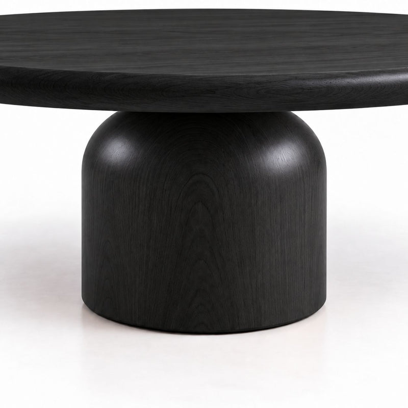 Close-Up of Sculptural Cylindrical Pedestal Base on Solen Round Solid Beech Wood Coffee Table in Black Finish by Tomruque