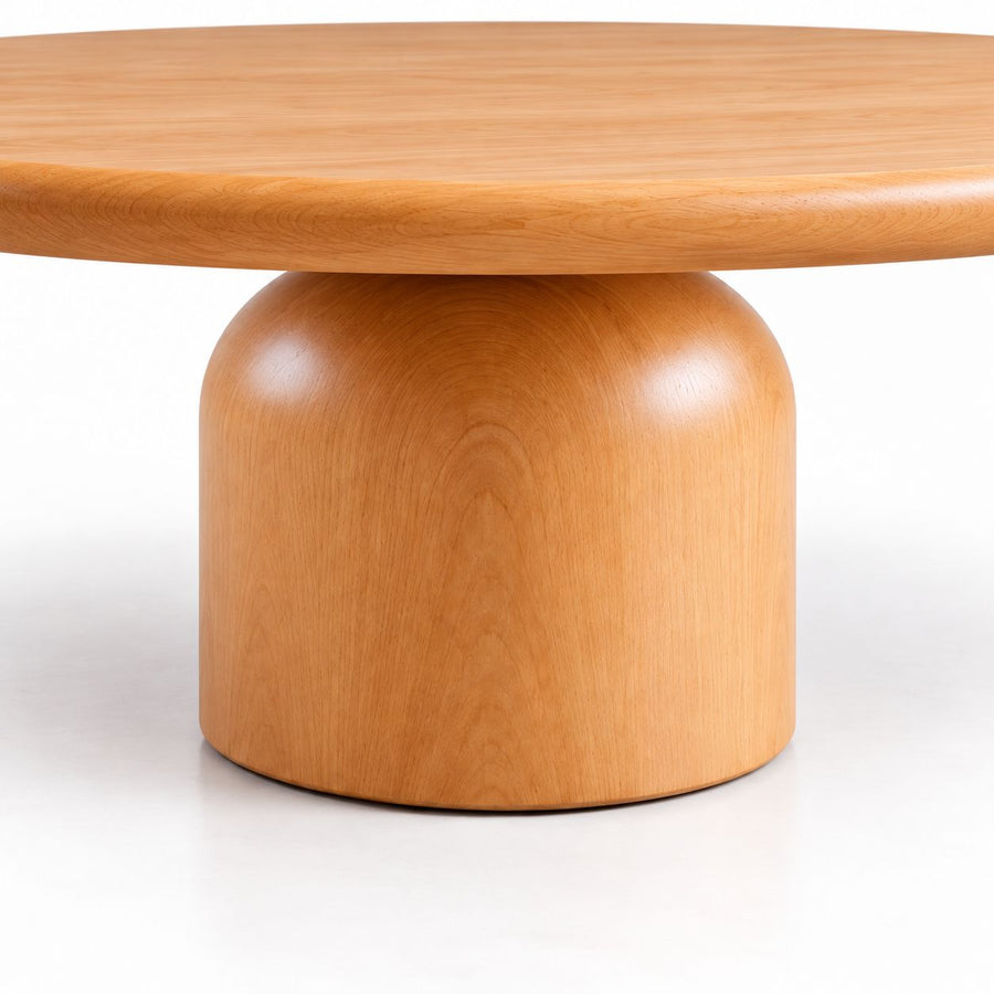 Close-Up of Sculptural Cylindrical Pedestal Base on Solen Round Solid Beech Wood Coffee Table in Natural Finish by Tomruque