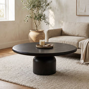 Solen Round Solid Beech Wood Pedestal Coffee Table Black in a Japandi Warm Minimalist Living Room Setup