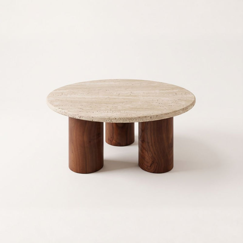Terra Round Travertine Coffee Table with Walnut Wood Triple Pedestal Base - Sculptural Modern Design Studio View by Tomruque