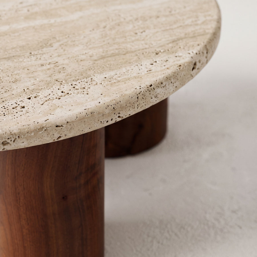High-Angle Macro Close-Up of Travertine Stone Top Surface and Walnut Base on Terra Round Coffee Table - Sculptural Modern Design by Tomruque