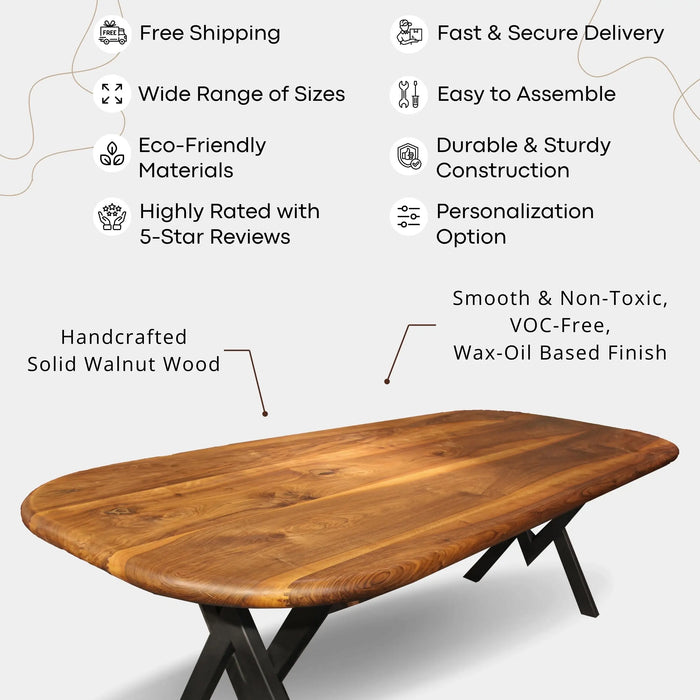 Wide shot of the Toledo walnut dining table set up with chairs in a contemporary dining space.