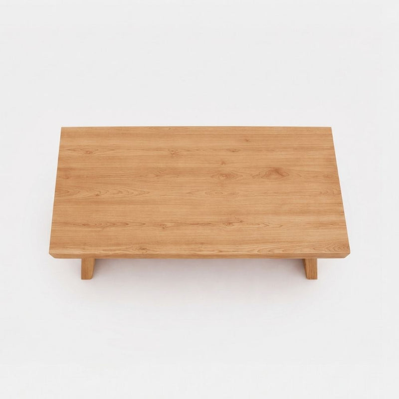 Yoro Solid Oak Wood Coffee Table with a light oak finish and short legs, shown from a top-down perspective on a white background.