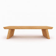 Yoro Solid Oak Wood Coffee Table with a natural oak finish, featuring a thick rectangular top and two angled wedge-shaped legs, shown against a plain white background.