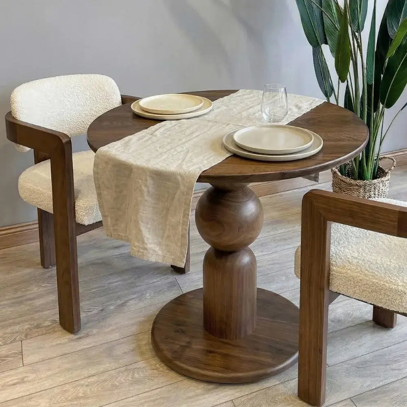 Dorel Round Walnut Dining Table with Sculptural Base – Modern Pedestal Design