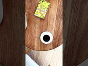 A youtube video about a walnut round coffee table for living room, made from solid wood with mid-century modern aesthetics, ideal for cozy setups.