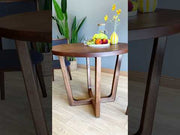 A dynamic showcase of the Muse mid-century dining table, highlighting its design, craftsmanship, and versatility.