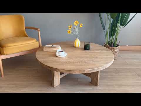 A video showcasing the Harlow round coffee table in different living room settings, highlighting its functional design and various finish options.